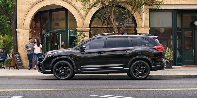 Black Subaru ascent parked on a city street